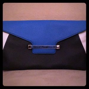 Vince Camuto “Julia” colorblock envelop clutch.